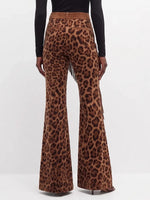 Bold Leopard Print Asymmetrical Fringe Flared Pants