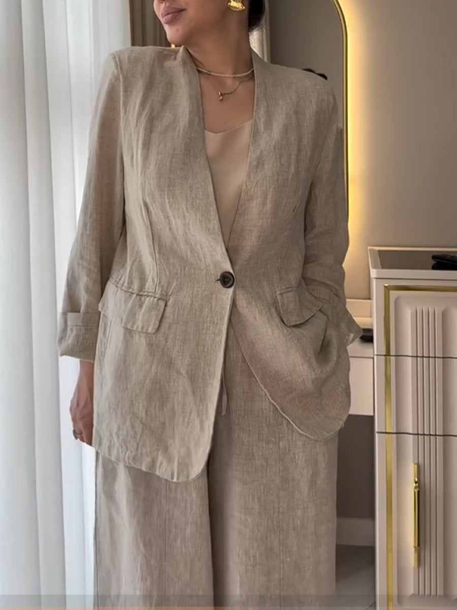 Two-piece Set Featuring A Casual Knit Cotton Top With Cut-out Details And Contrasting Color Trims, Paired With Linen-cotton Blend Trousers.