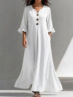 Long Dress Featuring A Partial Button-front, Gathered Details, Ruffled Three-quarter Sleeves, And A Flattering, Figure-concealing Fit