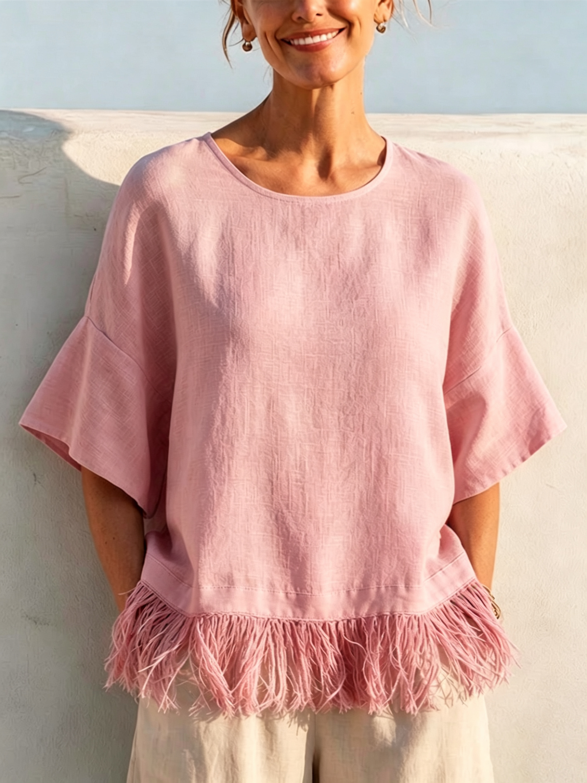 Solid-color Washed Linen Loose-fit Top Featuring A Round Neck, Ruffled Mid-length Sleeves, And A Tassel Hem—designed For A Relaxed, Flattering Fit